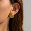 Daniela Aretes estilo vintage con turquesas