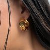 Sofía  aretes de divertidas ondas  Busca el brazalete a juego