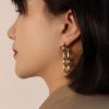 Alicia  Aretes largos de eslabones  dorado y plata para look  muy chic