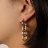 Alicia  Aretes largos de eslabones  dorado y plata para look  muy chic