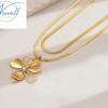 Odette collar con una moderna y elegante flor para lucirse busca los aretes y anillo a juego